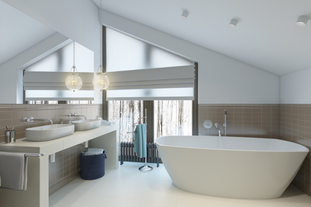 Прелестная ванная комната с отдельно стоящей ванной, душевой и просторной столешницей с двумя раковинами.